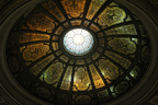 Photo of a stained glass roof over a rotunda